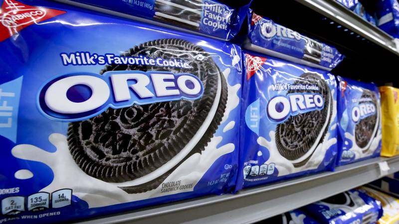 Packages of Nabisco Oreo cookies line a shelf in a market in Pittsburgh, Wednesday, Aug. 8, 2018.