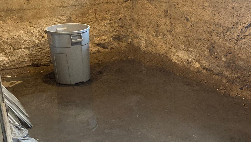 Septic water fills the basement at "Place of Grace" in Huntington.