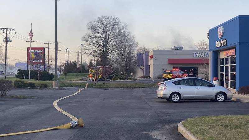 Crews respond to fire at store on Lima Road