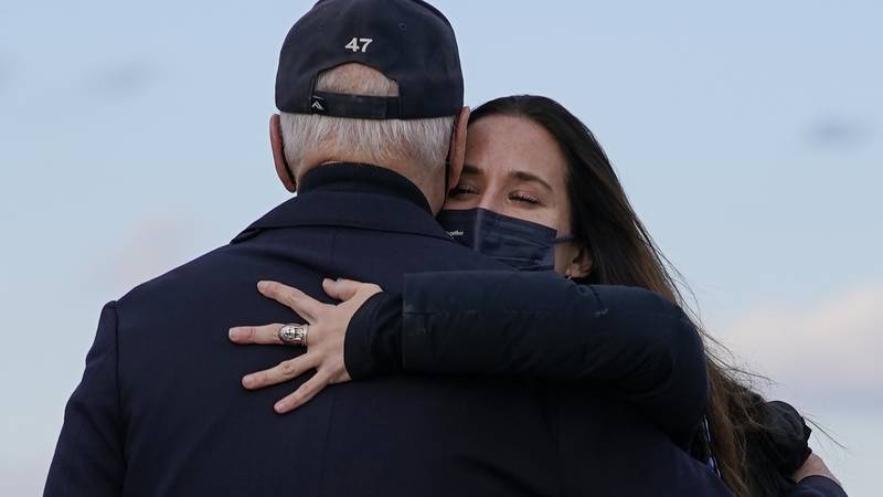 Ashley Biden hugs her father President Joe Biden as they arrive on Air Force one at Andrews Air...