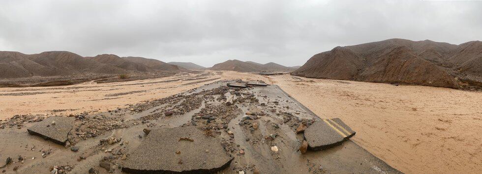 Flash flooding at Death Valley National Park triggered by heavy rainfall on Friday buried cars...