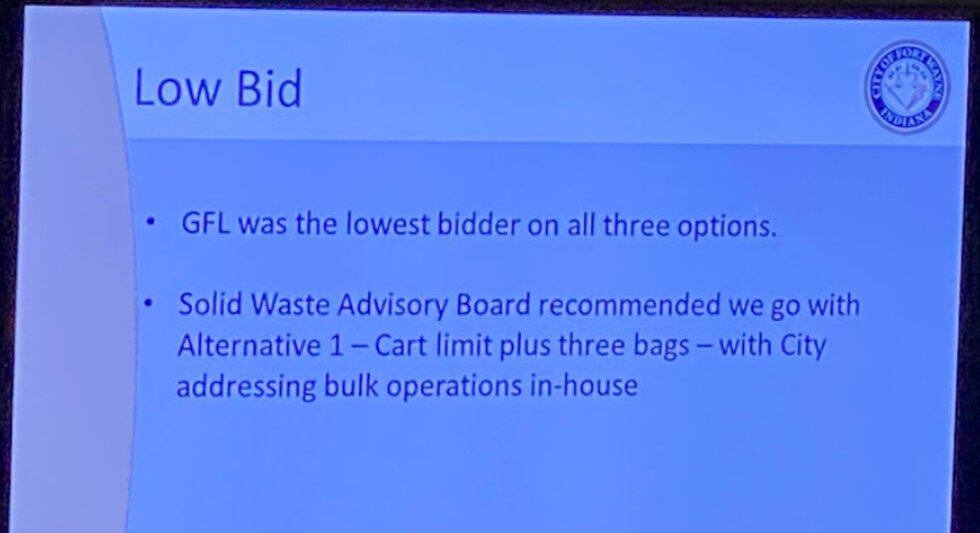 A slide presentation shows GFL Environmental submitted the lowest qualified bid to assume trash...