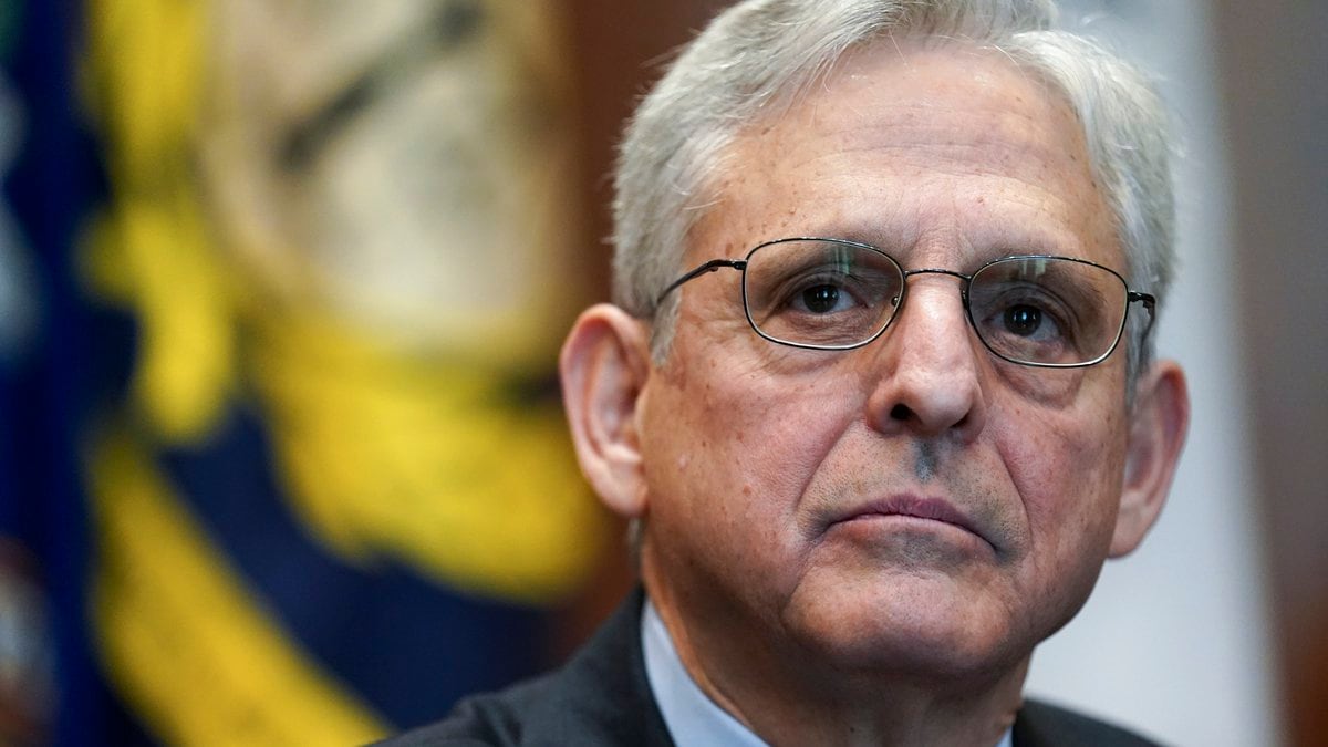FILE - Attorney General Merrick Garland listens during a meeting of the COVID-19 Fraud...