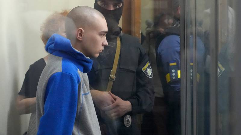 Russian army Sergeant Vadim Shishimarin, 21, is seen behind a glass during a court hearing in...