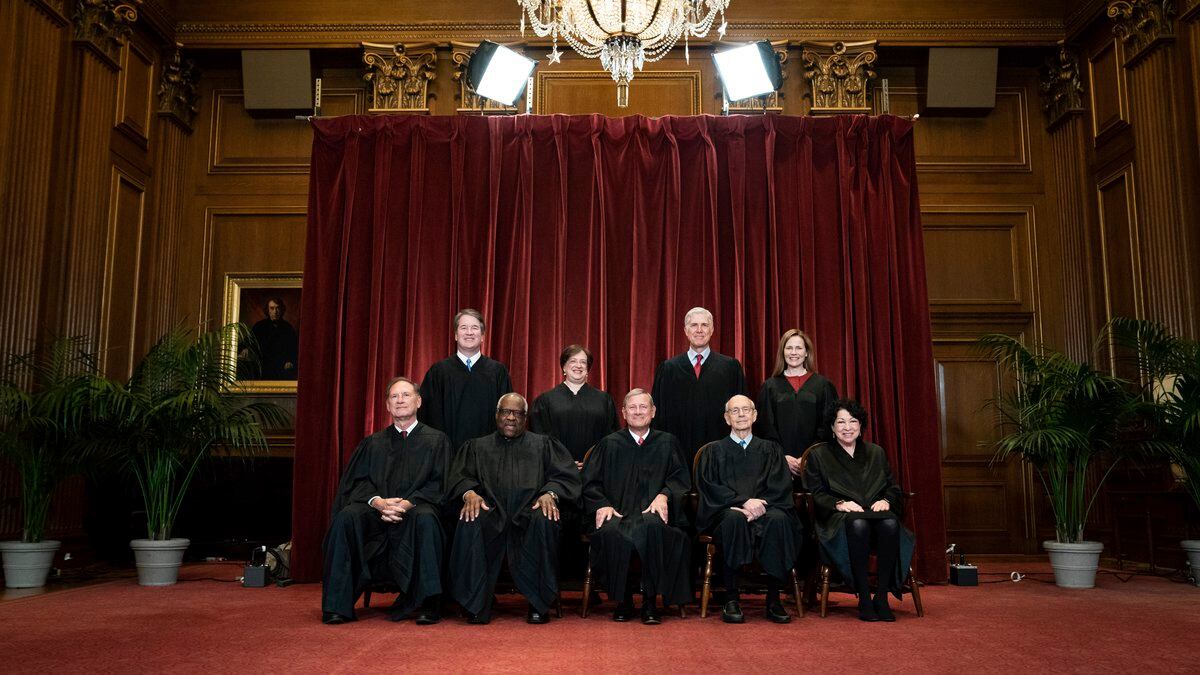 FILE - Members of the Supreme Court pose for a group photo at the Supreme Court in Washington,...