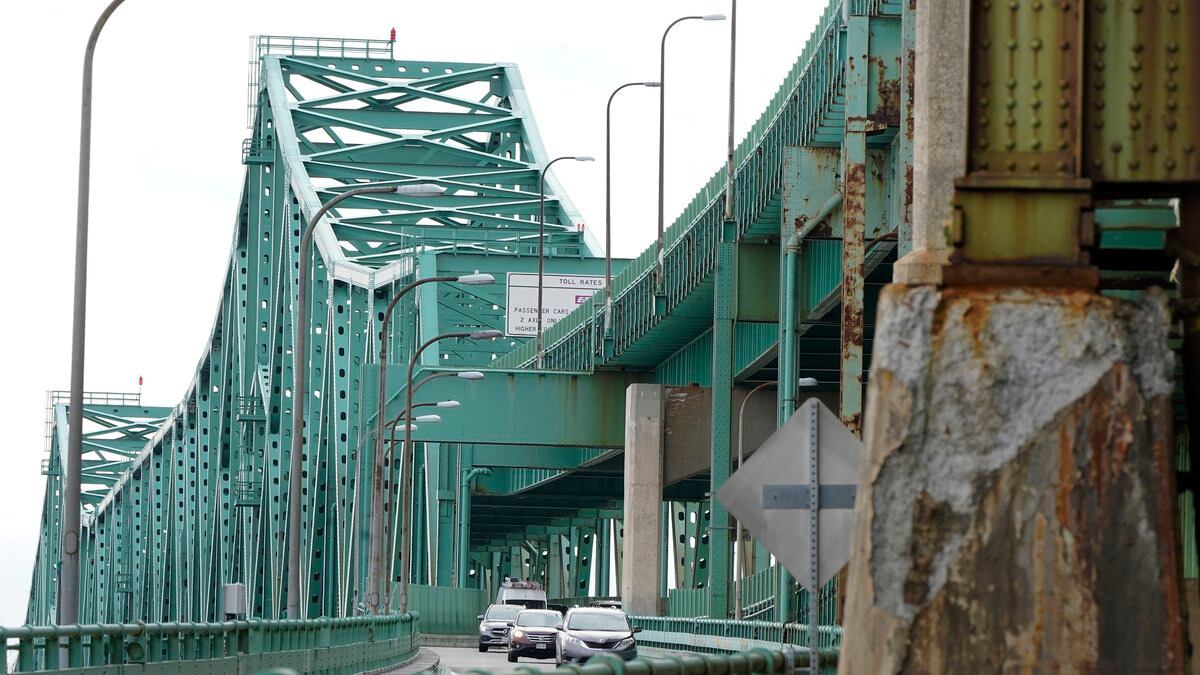 FILE - Drivers take an exit ramp off the Tobin Memorial Bridge, Wednesday, March 31, 2021, in...
