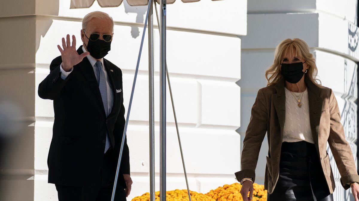 FILE - President Joe Biden and first lady Jill Biden walk to board Marine One on the South Lawn...