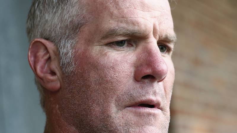 FILE - In this Oct. 17, 2018, file photo, former NFL quarterback Brett Favre speaks with...