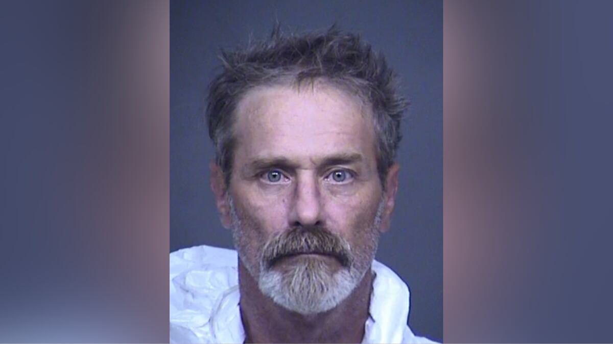 John Lagana, 61, is accused of intentionally running over a man and killing him in Arizona.