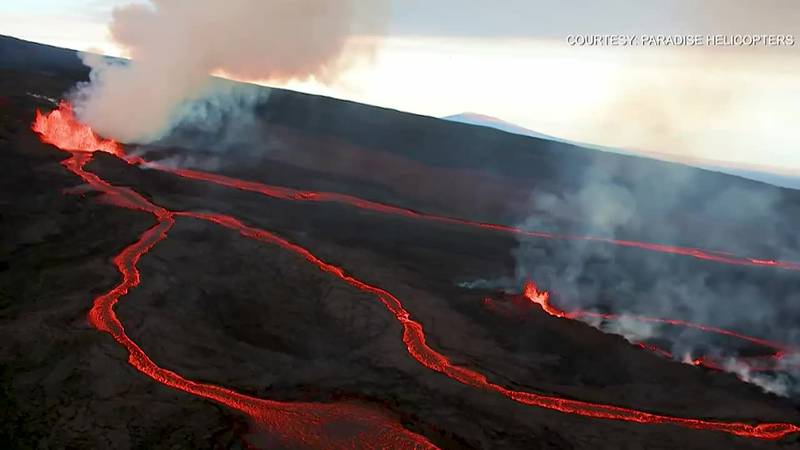 Aerial footage shows Mauna Loa spewing lava on Wednesday.
