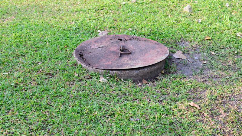 A toddler died after falling into a septic tank like this one.