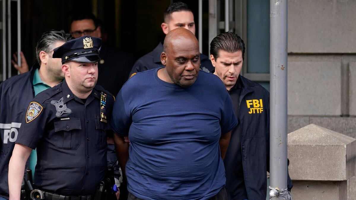 FILE - New York City Police and law enforcement officials lead subway shooting suspect Frank...